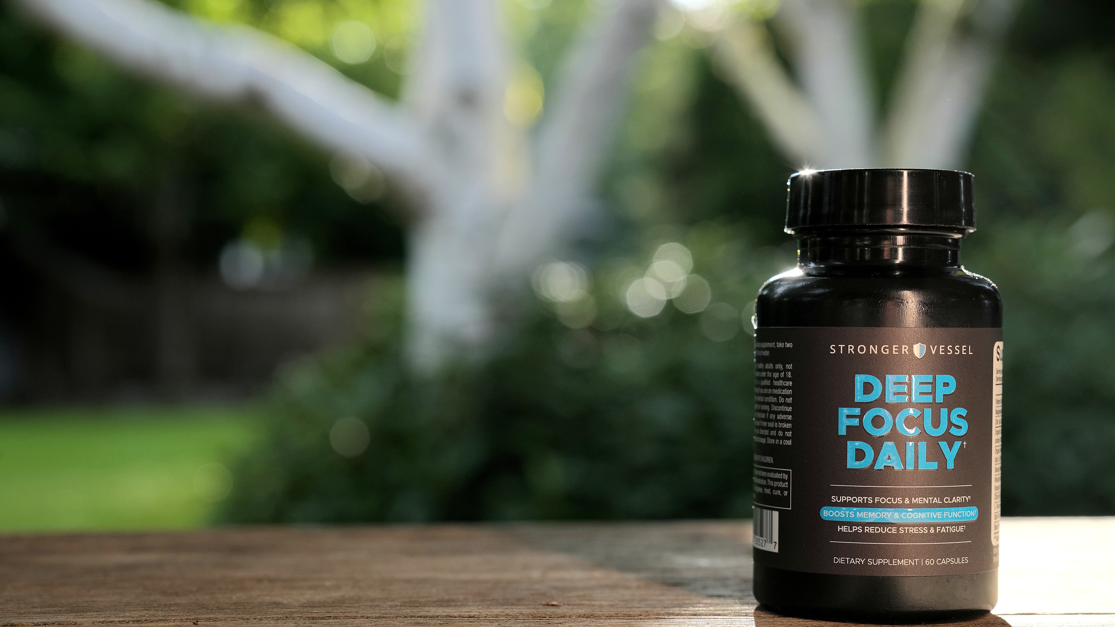 Deep Focus Daily bottle outdoors